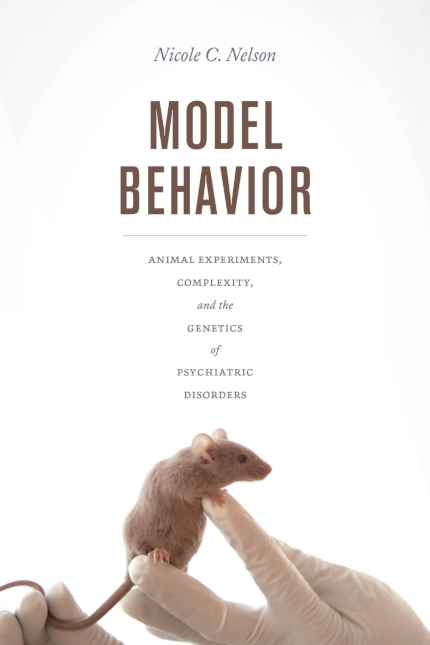 Front cover of my book "Model Behavior." The cover shows a mouse sitting on a gloved hand, its tail held by another gloved hand.